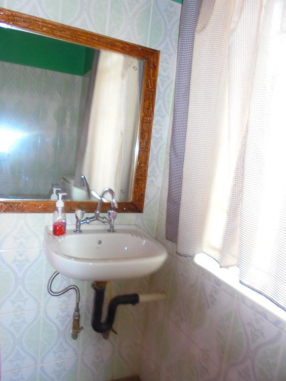 ליבינגסטון White Rose Lodge חדר תמונה