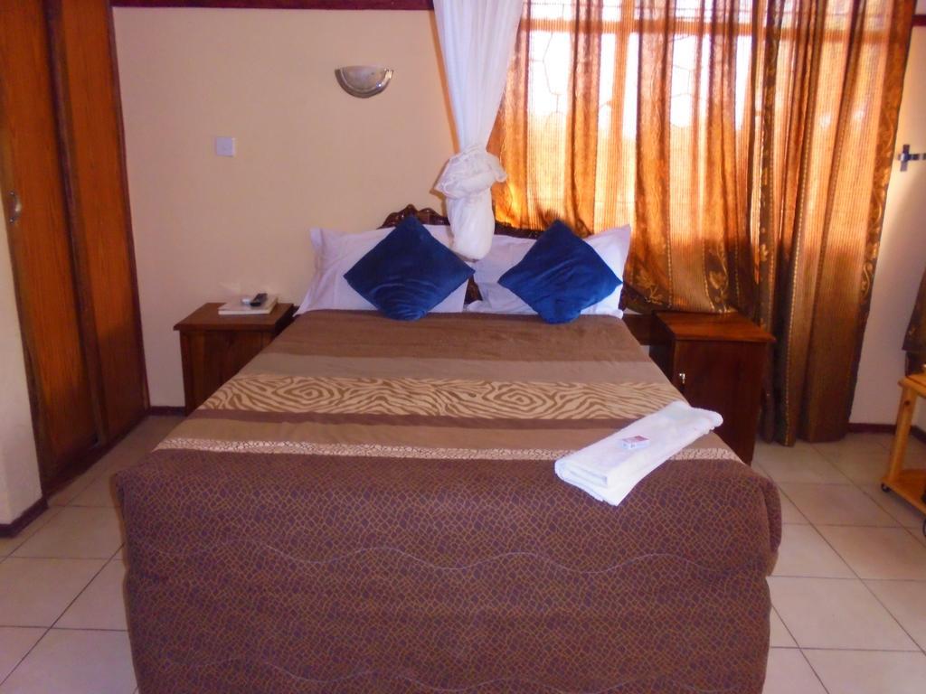 ליבינגסטון White Rose Lodge חדר תמונה