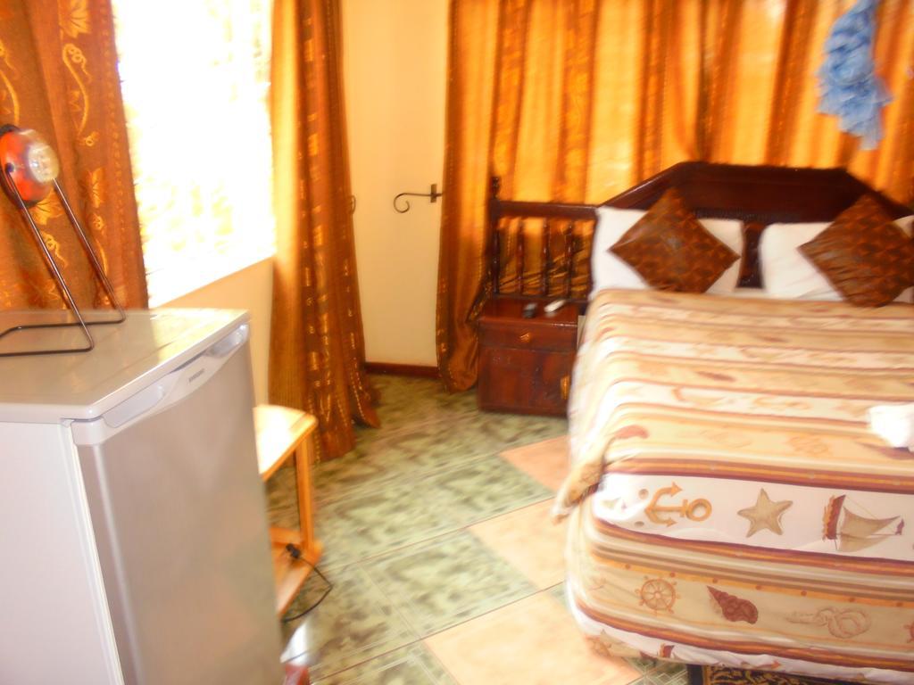 ליבינגסטון White Rose Lodge חדר תמונה